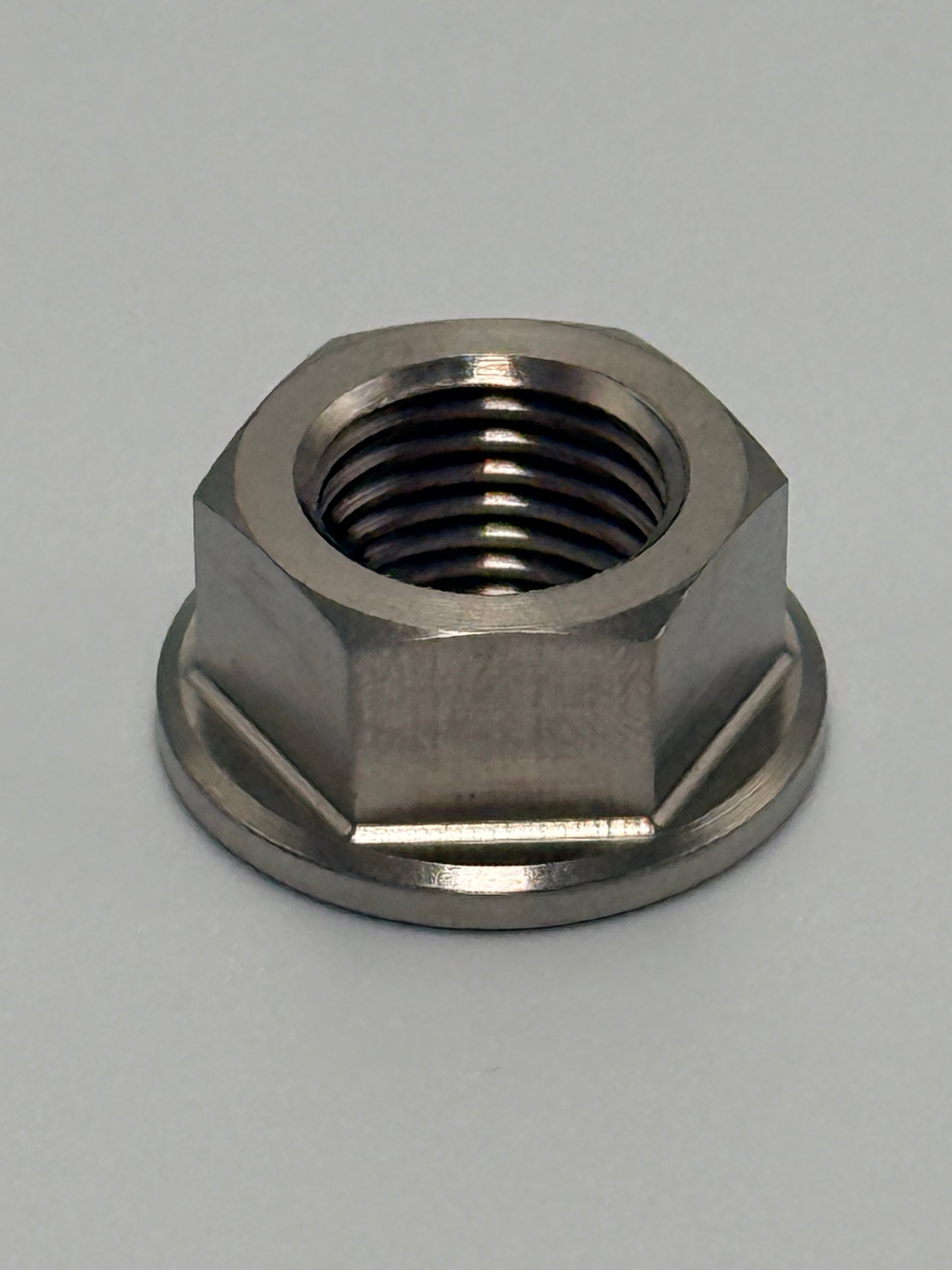 (1)  Trick Titanium Flywheel  Nut- Clone, Honda, Predator